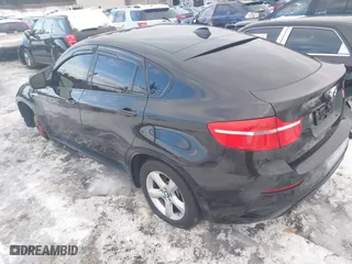 2011 BMW X6 M with VIN 5YMGZ0C57BLK14388, listed as a IAAI auction lot 41411854 with 129,248 mi miles. Bid and sale history available at carsss.com. Image 3.