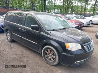 2012 Chrysler Town & Country Touring with VIN 2C4RC1BG7CR301101, listed as a IAAI auction lot 42173814 with 141,128 mi miles. Bid and sale history available at carsss.com. Image 1.