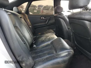 1996 Infiniti Q45 z VIN JNKNG01D1TM404004, wystawiony jako Copart lot #54433905 z przebiegiem 157 775 mil mil oraz Nie do naprawy. Historia ofert i sprzedaży dostępna na DreamBid. Obrazek 10.