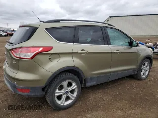 2014 Ford Escape SE with VIN 1FMCU9GX3EUB50432, listed as a Copart auction lot 50922755 with 276,474 mi miles and Clean Title. Bid and sale history available at DreamBid. Image 3.