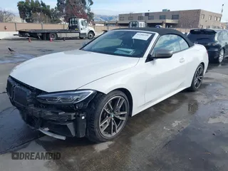 2022 BMW 4 Series M440i with VIN WBA53AT02NCJ20674, listed as a IAAI auction lot 41200398 with 28,235 mi miles and . Bid and sale history available at DreamBid. Image 18.
