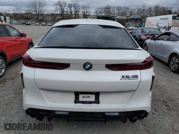 2022 BMW X6 M with VIN 5YMCY0C09N9J70336, listed as a Copart auction lot 52682365 with 0 mi miles and Salvage Title. Bid and sale history available at carsss.com. Image 6.