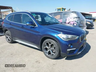 2018 BMW X1 xDrive28i with VIN WBXHT3C33J5L28506, listed as a IAAI auction lot 42713765 with 24,361 mi miles and . Bid and sale history available at DreamBid. Image 1.