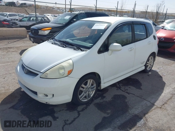 2007 Honda Fit Sport z VIN JHMGD38657S030086, wystawiony jako IAAI lot #41699824 z przebiegiem 224 648 mil mil oraz . Historia ofert i sprzedaży dostępna na DreamBid. Obrazek 2.