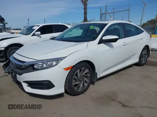 2017 Honda Civic EX z VIN 2HGFC2F76HH514686, wystawiony jako IAAI lot #41936117 z przebiegiem 56 711 mil mil oraz . Historia ofert i sprzedaży dostępna na DreamBid. Obrazek 17.