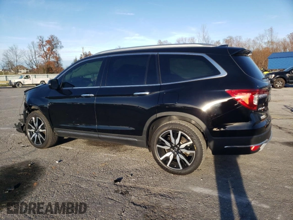 2021 Honda Pilot Touring 8-Passenger with VIN 5FNYF5H94MB039974, listed as a Copart auction lot 82654964 with 54,048 mi miles and Salvage Title. Bid and sale history available at DreamBid. Image 2.