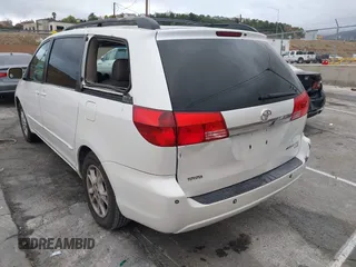 2004 Toyota Sienna XLE with VIN 5TDZA22C94S084569, listed as a IAAI auction lot 41482040 with 210,157 mi miles and . Bid and sale history available at DreamBid. Image 3.