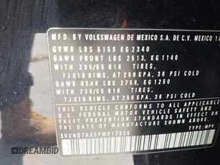 2023 Volkswagen Tiguan SE with VIN 3VVNB7AX5PM017938, listed as a IAAI auction lot 42453818 with 177,906 mi miles and . Bid and sale history available at DreamBid. Image 9.