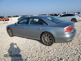 2012 Audi A8 with VIN WAURVAFD4CN023004, listed as a Copart auction lot 50181715 with 121,590 mi miles and Salvage title. Bid and sale history available at DreamBid. Image 2.