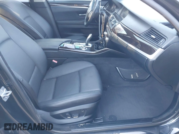 2013 BMW 5 Series 528i xDrive with VIN WBAXH5C58DD107515, listed as a IAAI auction lot 41673214 with 115,726 mi miles. Bid and sale history available at carsss.com. Image 5.