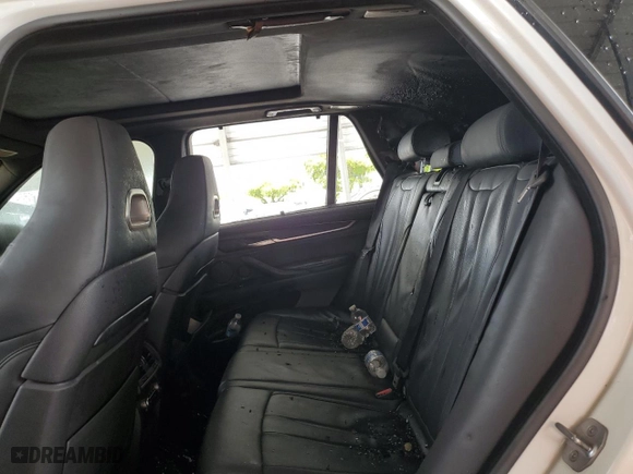 2015 BMW X5 M with VIN 5YMKT6C55F0C89468, listed as a Copart auction lot 75391074 with 0 mi miles and Salvage Title. Bid and sale history available at carsss.com. Image 11.