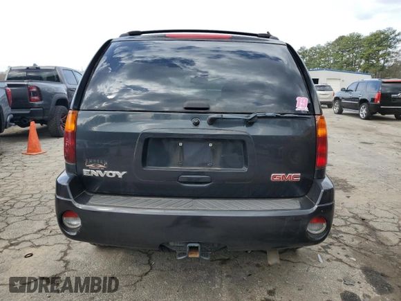 2003 GMC Envoy SLT z VIN 1GKDS13S332326838, wystawiony jako Copart lot #48888545 z przebiegiem 197 969 mil mil oraz Czysty tytuł • Clean title. Historia ofert i sprzedaży dostępna na DreamBid. Obrazek 6.