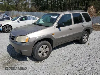 2001 Mazda Tribute LX with VIN 4F2YU091X1KM39019, listed as a Copart auction lot 50946945 with 255,148 mi miles and Salvage Title. Bid and sale history available at carsss.com. Image 1.
