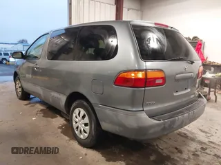 1999 Toyota Sienna CE with VIN 4T3GF19C5XU139787, listed as a IAAI auction lot 41167781 with 217,715 mi miles. Bid and sale history available at carsss.com. Image 3.