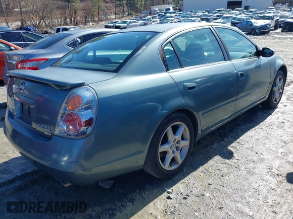 2002 Nissan Altima SE with VIN 1N4BL11E22C121586, listed as a IAAI auction lot 41409205 with 213,720 mi miles. Bid and sale history available at carsss.com. Image 4.