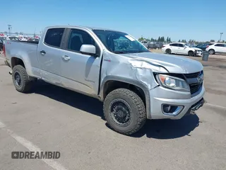 2018 Chevrolet Colorado 4WD Z71 z VIN 1GCPTDE16J1150026, wystawiony jako IAAI lot #42185263 z przebiegiem 99 841 mil mil oraz . Historia ofert i sprzedaży dostępna na DreamBid. Obrazek 1.
