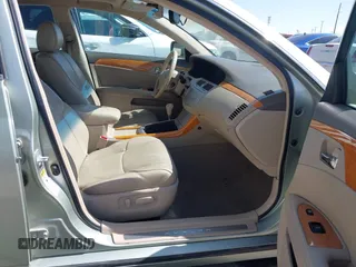 2007 Toyota Avalon XL with VIN 4T1BK36B07U239298, listed as a IAAI auction lot 42046413 with 221,018 mi miles. Bid and sale history available at carsss.com. Image 5.
