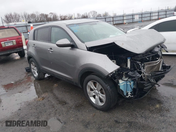 2012 Kia Sportage LX with VIN KNDPB3A29C7273864, listed as a IAAI auction lot 41543862 with 140,897 mi miles. Bid and sale history available at carsss.com. Image 1.