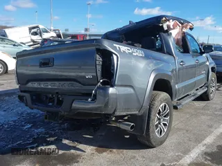 2023 Toyota Tacoma SR with VIN 3TMCZ5AN9PM574534, listed as a IAAI auction lot 41167910 with 27,375 mi miles and . Bid and sale history available at DreamBid. Image 4.