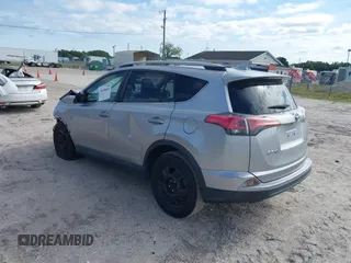 2017 Toyota RAV4 LE with VIN 2T3ZFREV2HW324895, listed as a IAAI auction lot 39150601 with 111,676 mi miles and . Bid and sale history available at carsss.com. Image 3.