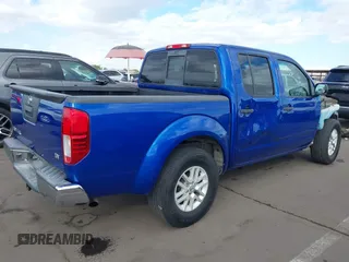 2014 Nissan Frontier SV with VIN 1N6AD0ER1EN765693, listed as a IAAI auction lot 41560914 with 165,572 mi miles and . Bid and sale history available at DreamBid. Image 4.