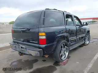 2004 Chevrolet Tahoe LT with VIN 1GNEK13T54J146851, listed as a IAAI auction lot 41990571 with 172,025 mi miles. Bid and sale history available at carsss.com. Image 4.