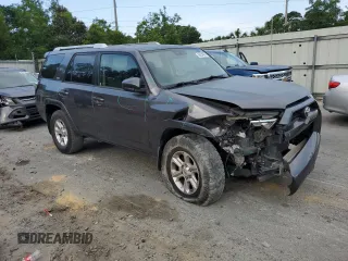 2014 Toyota 4Runner SR5 with VIN JTEZU5JR6E5069089, listed as a Copart auction lot 56234695 with 147,684 mi miles and Salvage title. Bid and sale history available at DreamBid. Image 4.