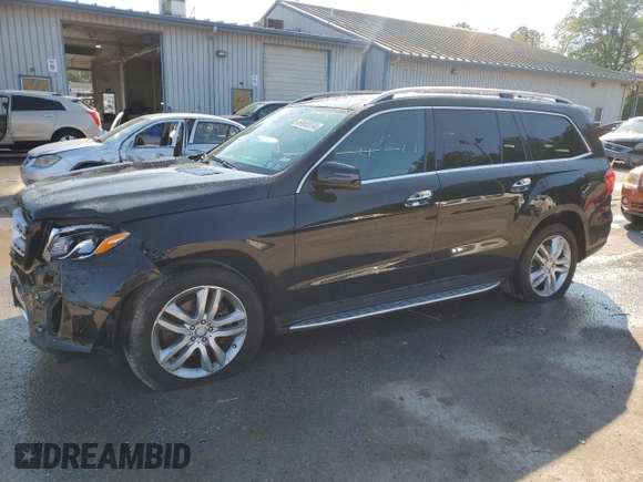 2017 Mercedes-Benz GLS 450 with VIN 4JGDF6EE9HA874694, listed as a Copart auction lot 69668974 with 128,694 mi miles and Salvage Title. Bid and sale history available at DreamBid. Image 1.