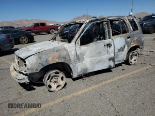 2001 Suzuki Grand Vitara JLX z VIN JS3TD62V914154537, wystawiony jako Copart lot #73693264 z przebiegiem Nie podano mil oraz Nie do naprawy • Non repairable. Historia ofert i sprzedaży dostępna na DreamBid. Obrazek 1.