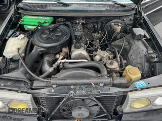 1984 Mercedes-Benz 300 with VIN WDBAB53A5EA022012, listed as a Copart auction lot 56141945 with 114,089 mi miles and Clean Title. Bid and sale history available at DreamBid. Image 7.