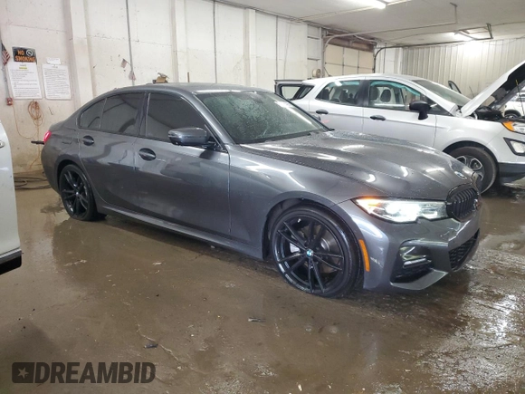 2019 BMW 3 Series 330i xDrive with VIN WBA5R7C57KAJ86027, listed as a Copart auction lot 61203435 with 41,486 mi miles and Salvage title. Bid and sale history available at DreamBid. Image 4.
