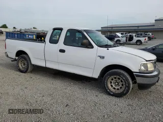 1998 Ford F-150 with VIN 1FTZX17W2WKB25677, listed as a Copart auction lot 54419145 with 319,584 mi miles and Salvage title. Bid and sale history available at DreamBid. Image 4.