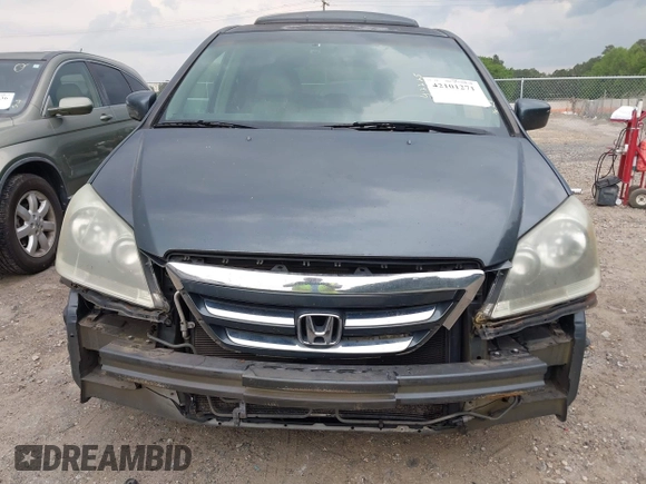 2006 Honda Odyssey EX-L z VIN 5FNRL38756B420817, wystawiony jako IAAI lot #42101271 z przebiegiem 203 892 mil mil oraz . Historia ofert i sprzedaży dostępna na DreamBid. Obrazek 13.
