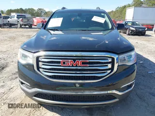 2018 GMC Acadia SLE z VIN 1GKKNSLS3JZ203954, wystawiony jako IAAI lot #41865381 z przebiegiem 99 891 mil mil oraz . Historia ofert i sprzedaży dostępna na DreamBid. Obrazek 12.