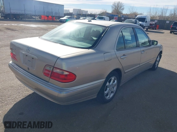 2002 Mercedes-Benz E-Class with VIN WDBJF65J92B479841, listed as a IAAI auction lot 41471955 with 203,527 mi miles. Bid and sale history available at carsss.com. Image 4.