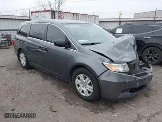 2013 Honda Odyssey LX with VIN 5FNRL5H24DB042230, listed as a IAAI auction lot 40954067 with 212,154 mi miles. Bid and sale history available at carsss.com. Image 1.
