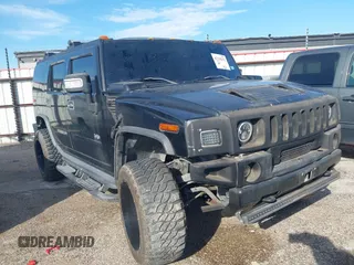 2006 Hummer H2 z VIN 5GRGN23U66H109968, wystawiony jako IAAI lot #42335112 z przebiegiem 167 922 mil mil oraz . Historia ofert i sprzedaży dostępna na DreamBid. Obrazek 1.