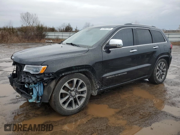 2017 Jeep Grand Cherokee Overland with VIN 1C4RJFCG0HC836448, listed as a Copart auction lot 47053705 with 87,459 mi miles and Salvage Title. Bid and sale history available at carsss.com. Image 1.
