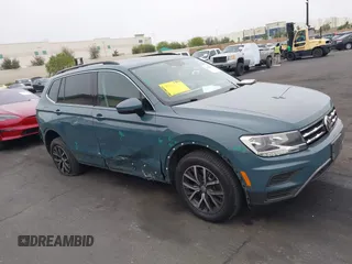 2019 Volkswagen Tiguan SE with VIN 3VV3B7AX3KM113955, listed as a IAAI auction lot 42164890 with 77,806 mi miles and . Bid and sale history available at DreamBid. Image 6.