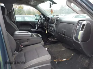 2014 Chevrolet Silverado 1500 LT with VIN 1GCVKREC3EZ192671, listed as a IAAI auction lot 41667814 with 124,292 mi miles and . Bid and sale history available at DreamBid. Image 5.