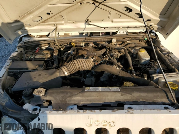 2009 Jeep Wrangler X with VIN 1J4FA241X9L782609, listed as a Copart auction lot 88790305 with 120,450 mi miles and Clean Title. Bid and sale history available at DreamBid. Image 12.