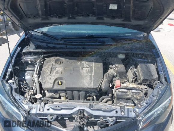 2018 Toyota Corolla L with VIN 5YFBURHE1JP832911, listed as a IAAI auction lot 42237901 with 92,158 mi miles and . Bid and sale history available at DreamBid. Image 10.
