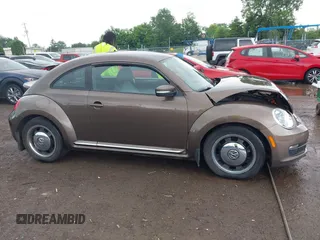 2012 Volkswagen Beetle 2.5L PZEV with VIN 3VWJP7AT2CM638265, listed as a IAAI auction lot 42512449 with 137,129 mi miles and . Bid and sale history available at DreamBid. Image 13.