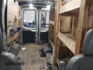 2015 Ford Transit Cargo with VIN 1FTNR1CM6FKA19083, listed as a IAAI auction lot 41790045 with 56,762 mi miles and . Bid and sale history available at carsss.com. Image 17.