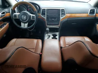 2013 Jeep Grand Cherokee Overland with VIN 1C4RJECT2DC590911, listed as a Copart auction lot 42939405 with 136,673 mi miles and Salvage Title. Bid and sale history available at carsss.com. Image 8.