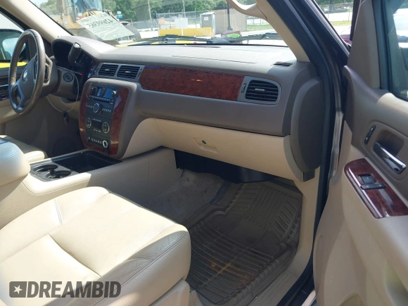2012 Chevrolet Suburban LT with VIN 1GNSKJE72CR130111, listed as a IAAI auction lot 42699365 with 216,827 mi miles and . Bid and sale history available at DreamBid. Image 5.