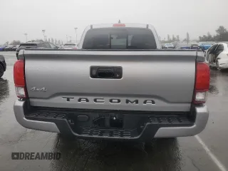 2021 Toyota Tacoma SR with VIN 3TYSX5EN3MT005576, listed as a Copart auction lot 48901965 with 71,725 mi miles and Salvage title. Bid and sale history available at DreamBid. Image 6.