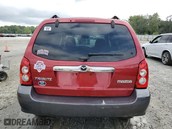 2005 Mazda Tribute S with VIN 4F2CZ04125KM19257, listed as a Copart auction lot 67370664 with 140,348 mi miles and Salvage Title. Bid and sale history available at DreamBid. Image 6.