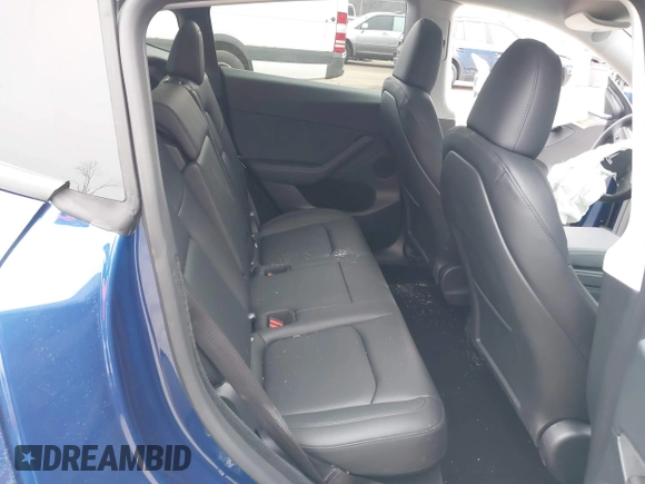 2025 Tesla Model Y Long Range with VIN 7SAYGDED9SF248370, listed as a IAAI auction lot 41336869 with 2,499 mi miles and . Bid and sale history available at DreamBid. Image 8.
