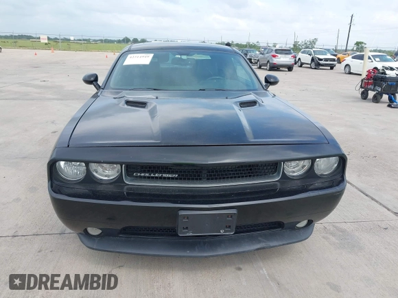 2012 Dodge Challenger SXT Plus z VIN 2C3CDYAG2CH281069, wystawiony jako IAAI lot #42314949 z przebiegiem 167 592 mil mil oraz . Historia ofert i sprzedaży dostępna na DreamBid. Obrazek 12.